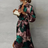 Floral belted shirt dress in dark green, front view