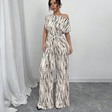 Zaira | One Shoulder Polka Dot Wide Leg Belted Jumpsuit