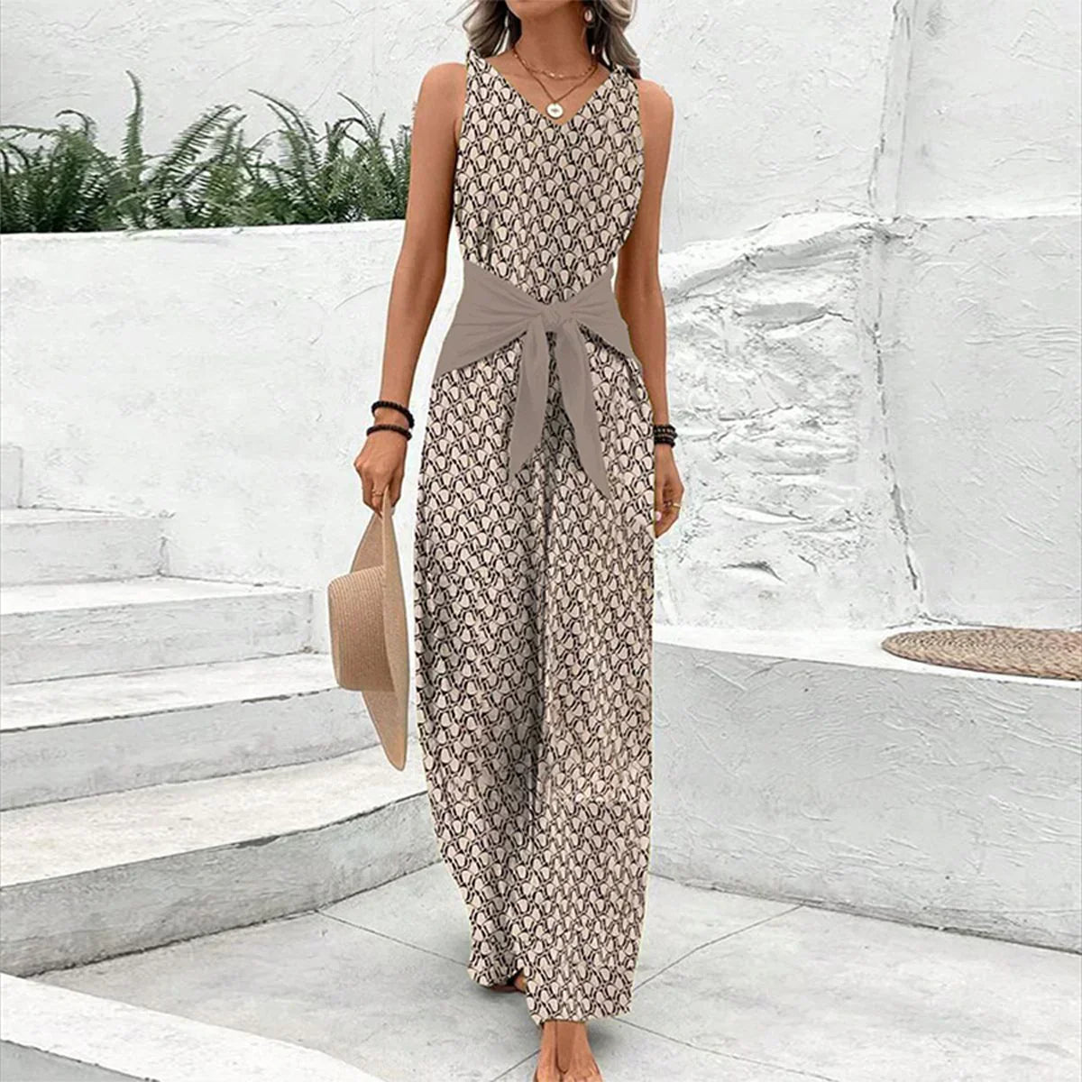 Sleeveless V-neck jumpsuit with tie waist, front view