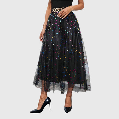 Flowy pleated skirt showing feminine drape