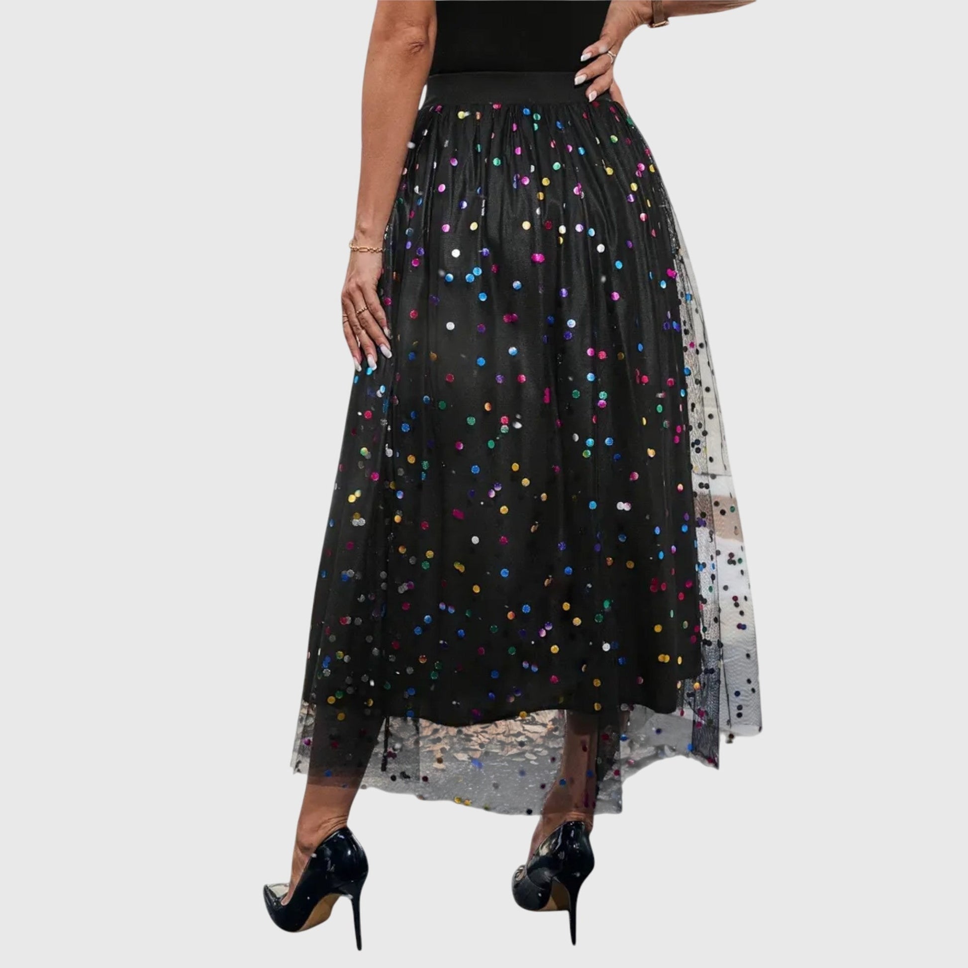 Pleated midi skirt styled with tucked-in top