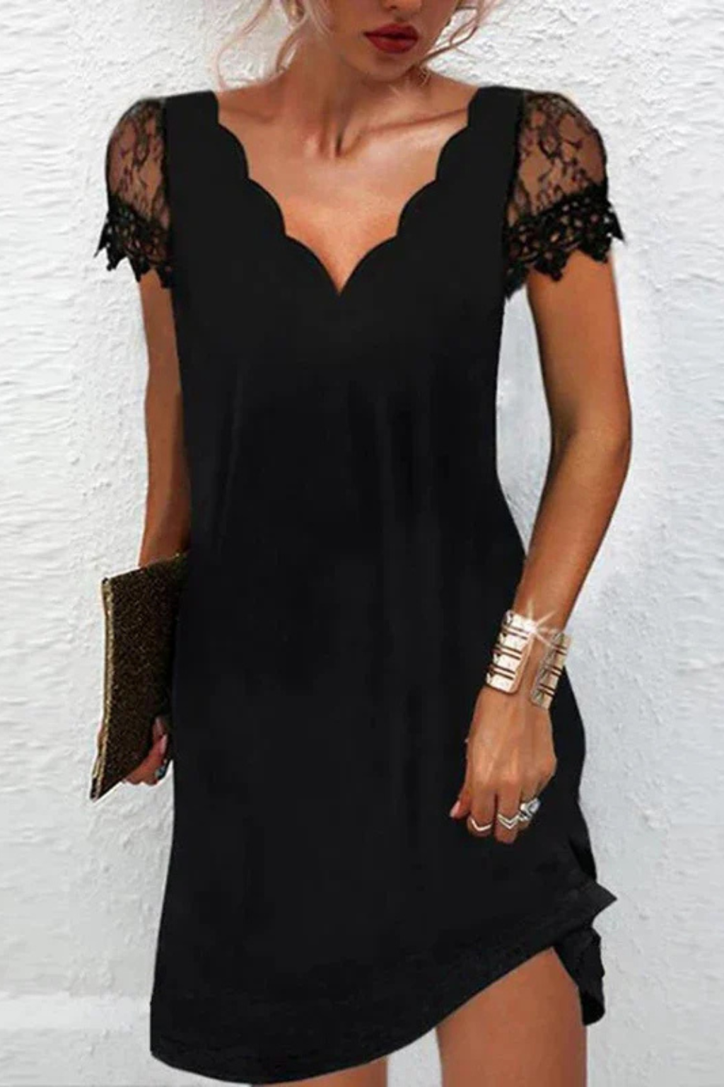 Cora black mini dress with V-neckline detail