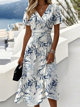 V-neck short-sleeve printed midi dress in white, front view