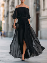 Off-shoulder pleated maxi dress in black, front view