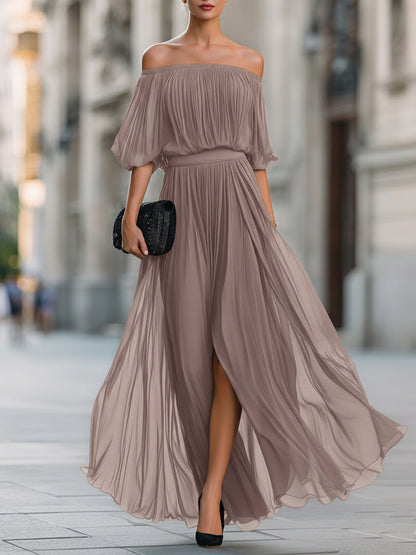 Pleated maxi dress showing fabric drape