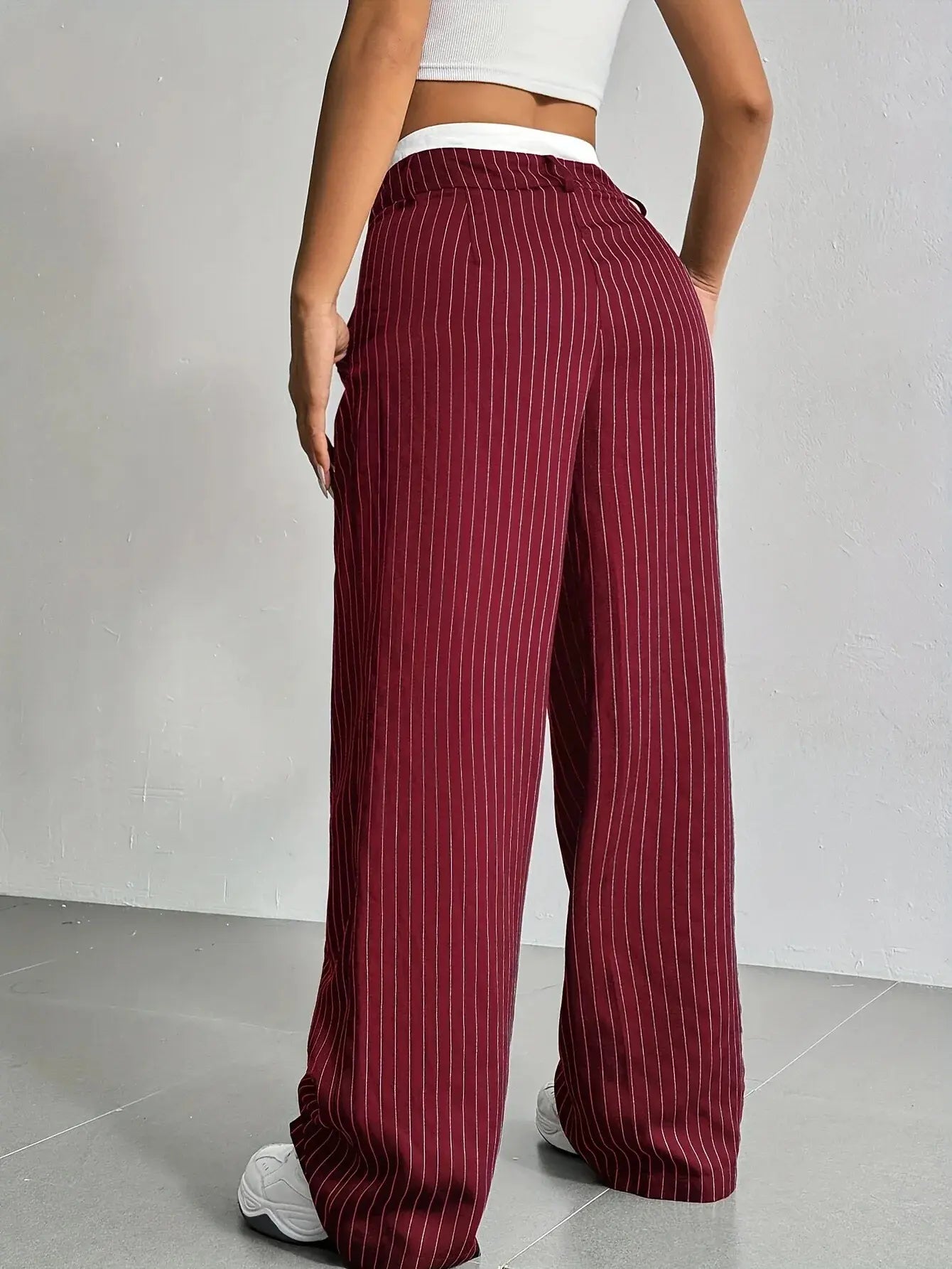 Striped wide-leg trousers showing fabric detail