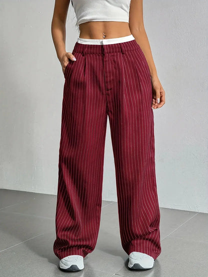 High-waist striped trousers, full-length view