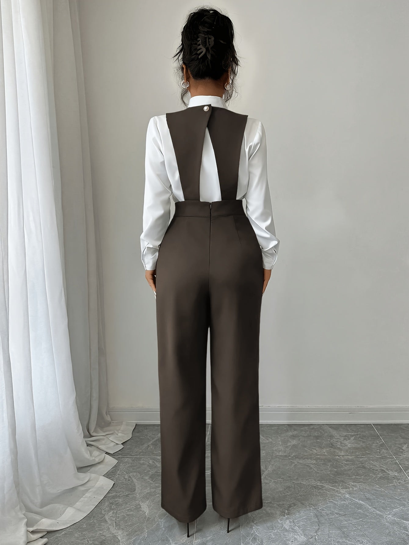 Wide-leg jumpsuit shown on model