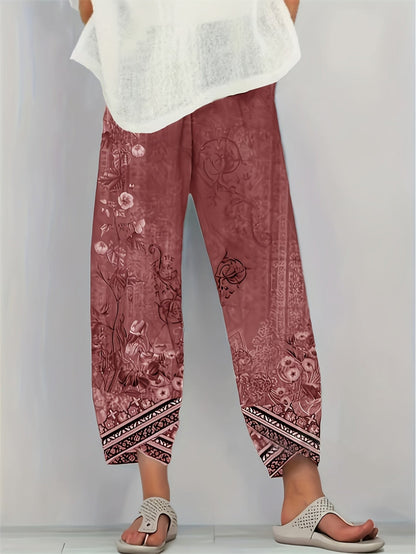 Cropped trousers in black botanical print colourway