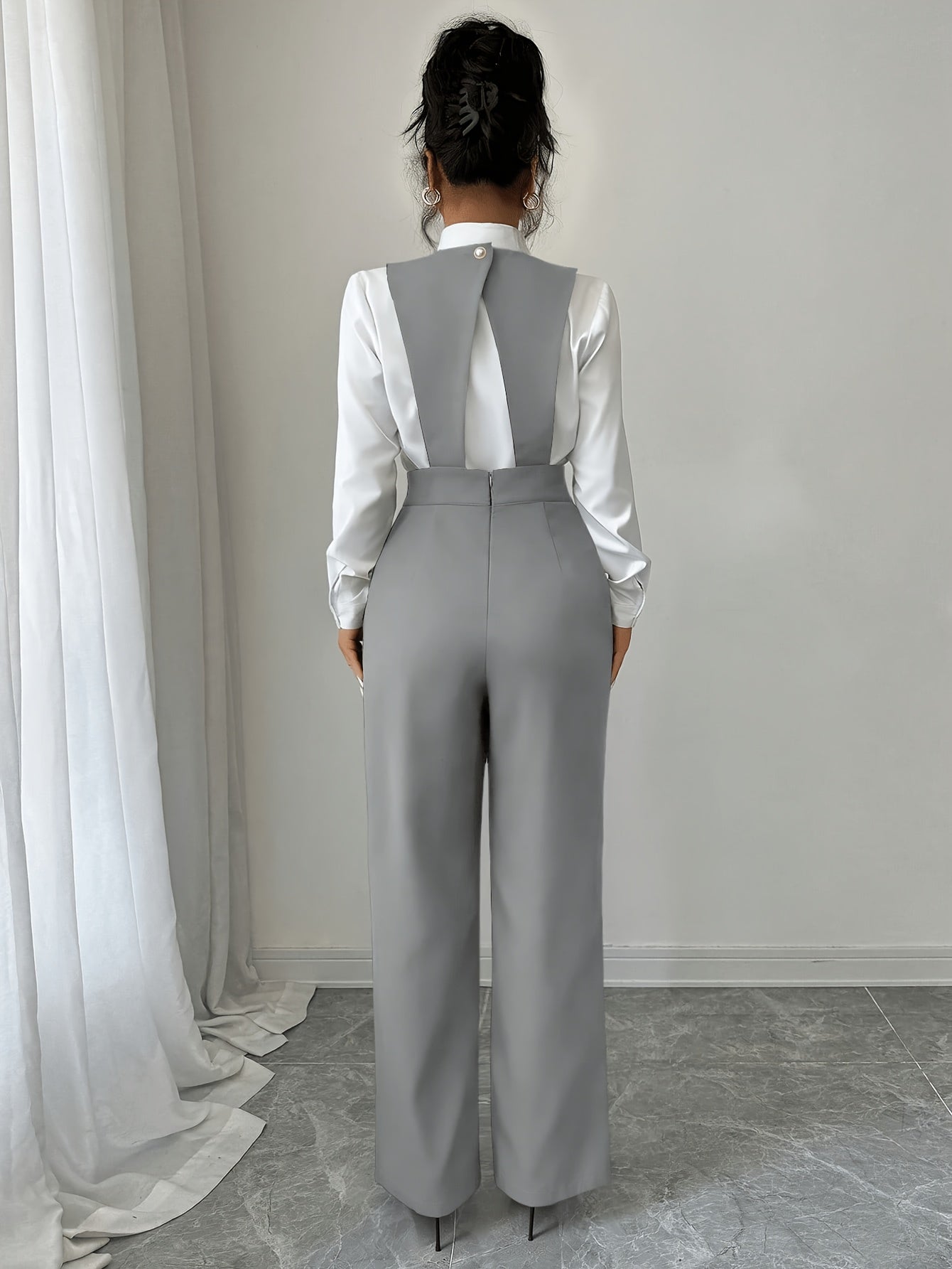 Tailored jumpsuit showing high waist construction