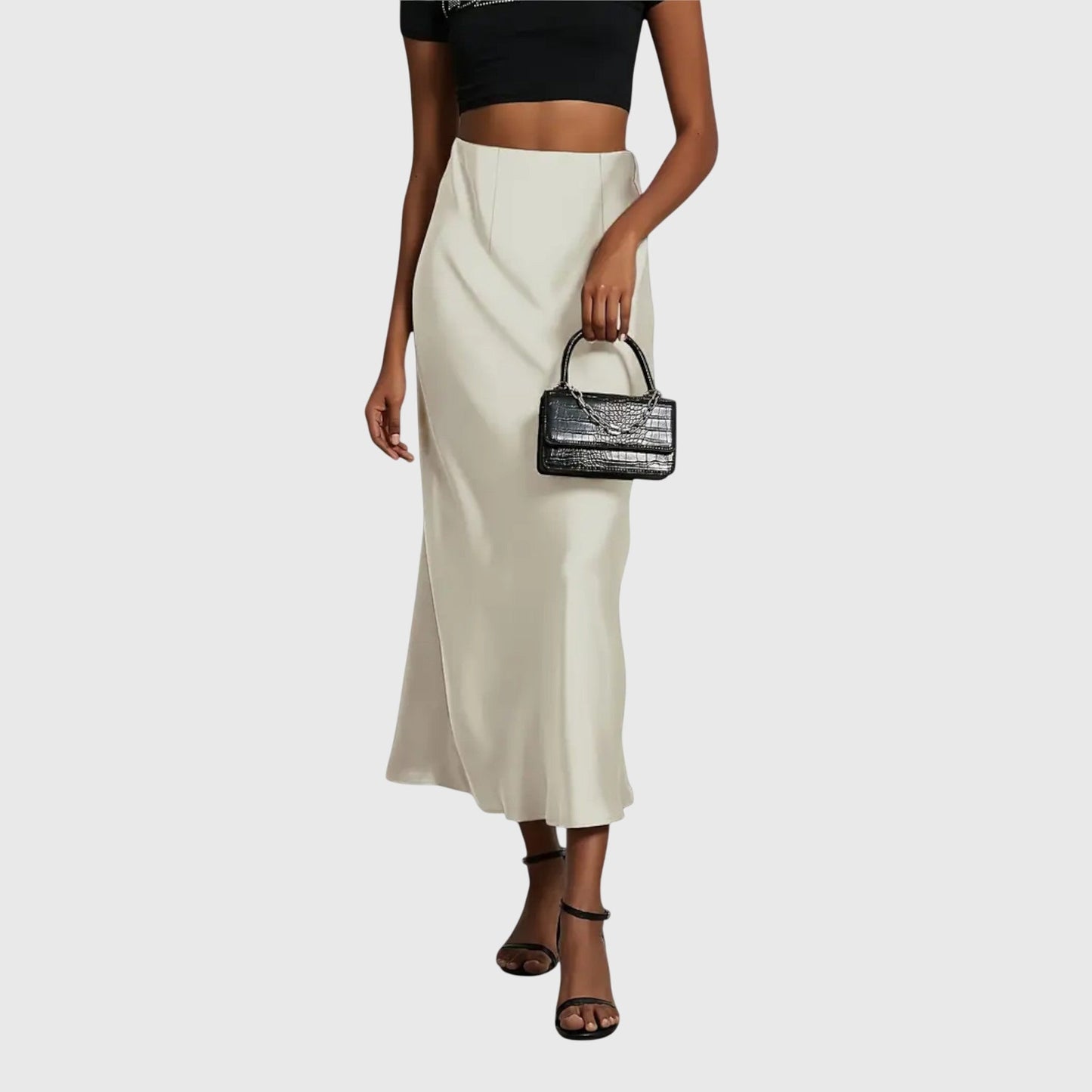 Fishtail skirt showing flared hem drape