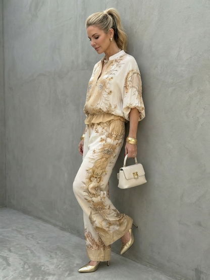 Two-piece set showing zip front and stand neckline