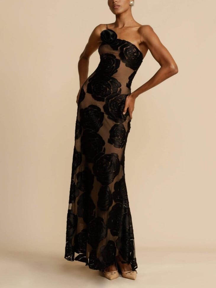 Floral maxi dress on black ground, full-length view