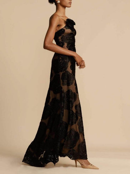 Black floral maxi dress showing flowing silhouette