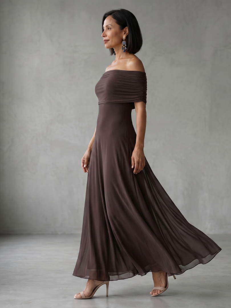 Off-shoulder midi dress showing draped bodice detail