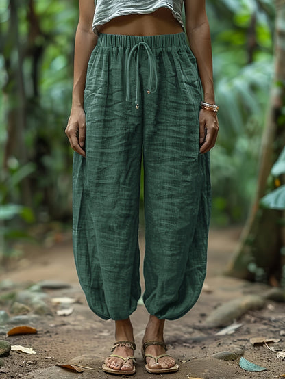 Lantern trousers showing elastic drawstring waist