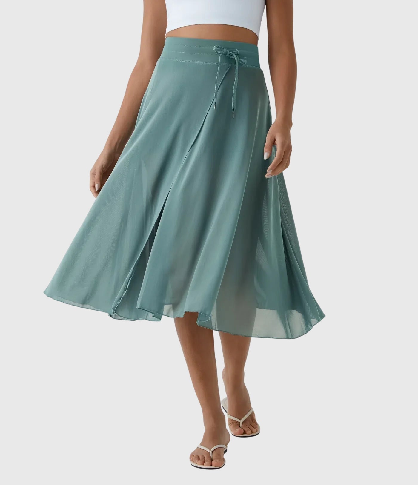 High-waist pleated midi skirt in green, front view