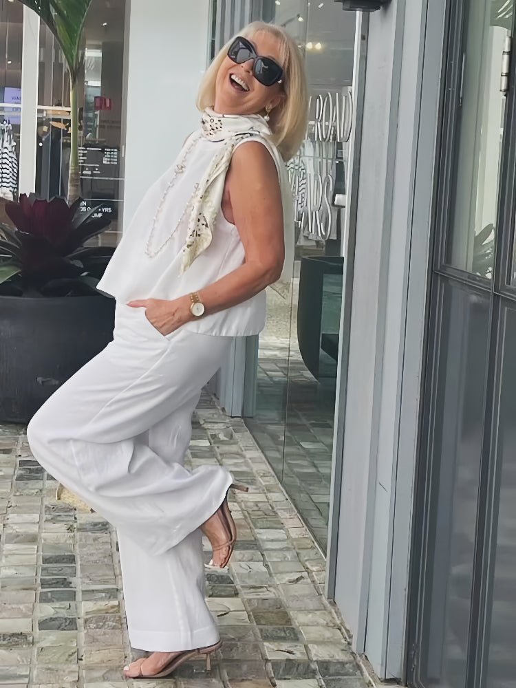 White two-piece set showing tailored top
