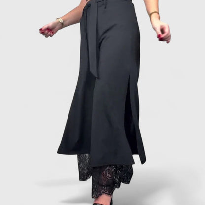Elegant wide-leg trousers styled for evening