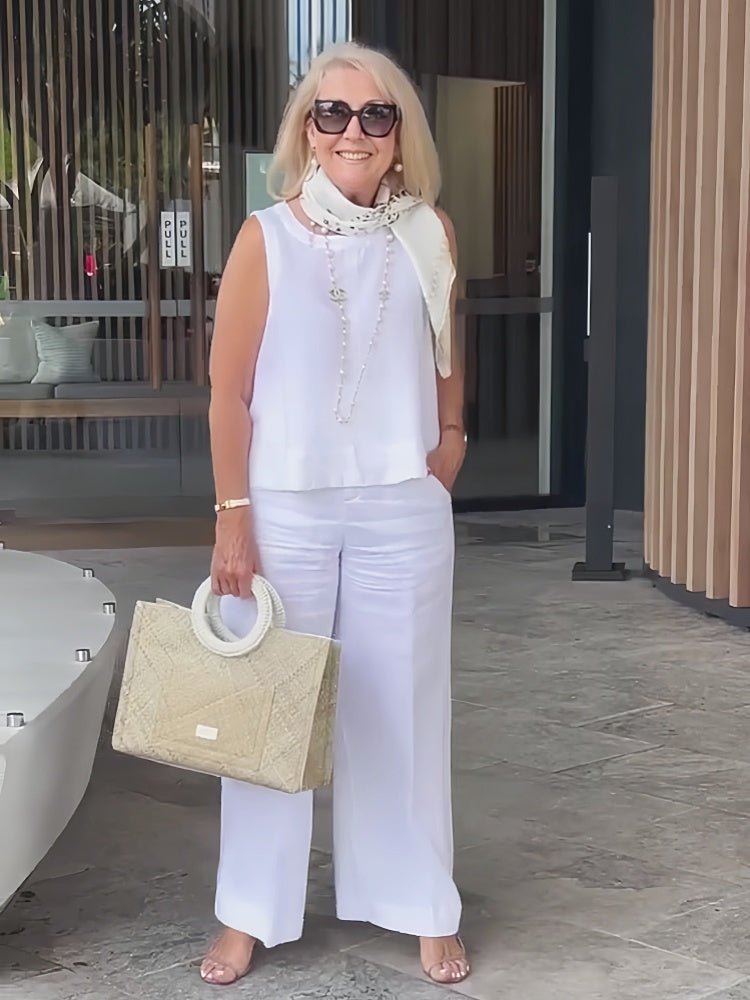 White top and relaxed trouser set detail