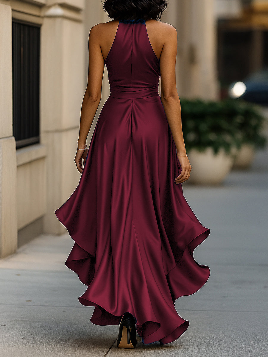 Satin halter gown showing ruffle detail