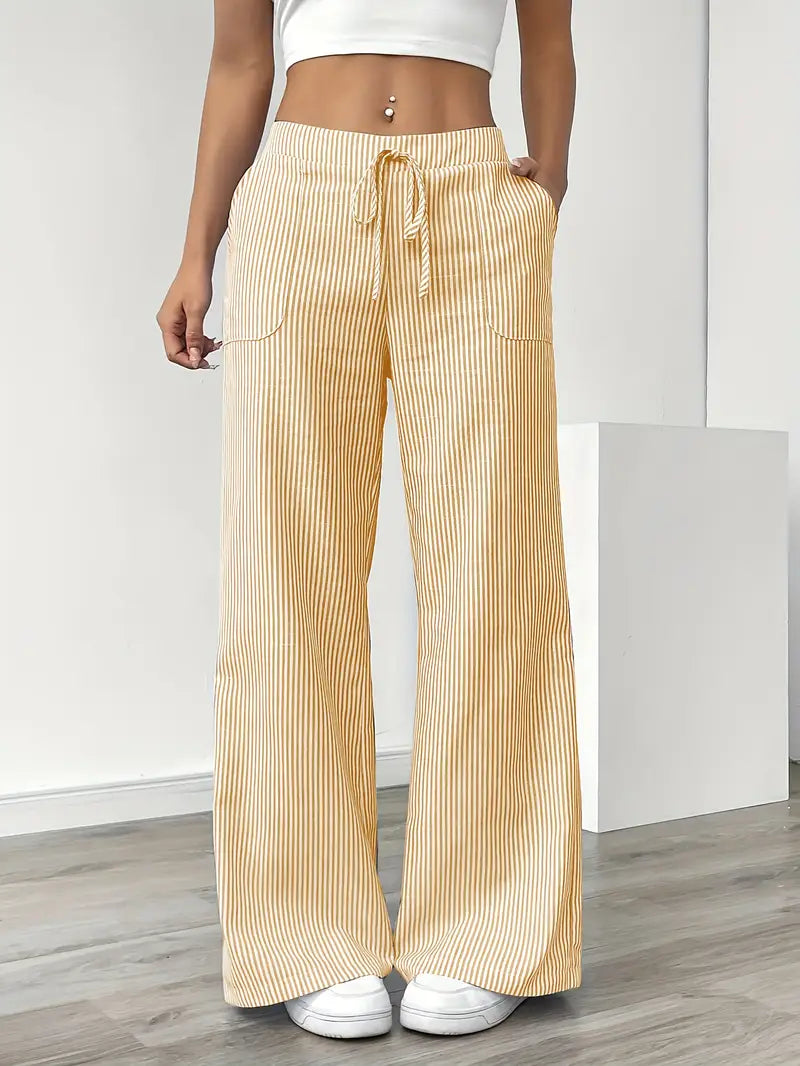 Striped wide-leg trousers in yellow, front view