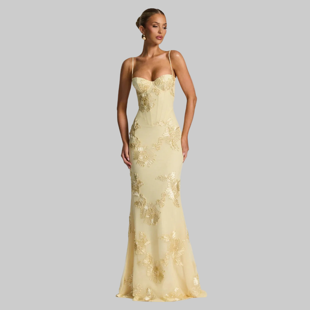 Maxi dress showing 3D floral appliqué detail