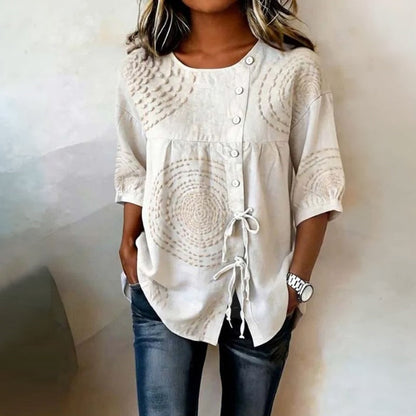 Embroidered drawstring top detail view