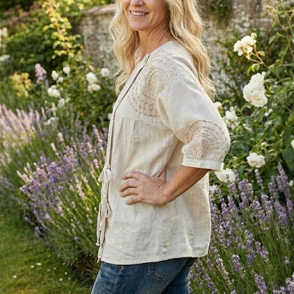 Drawstring hem top, side view