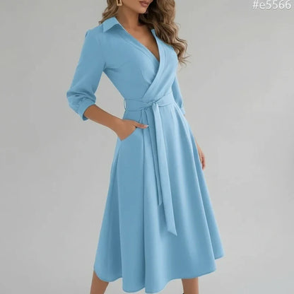 A-line midi dress showing belted waist
