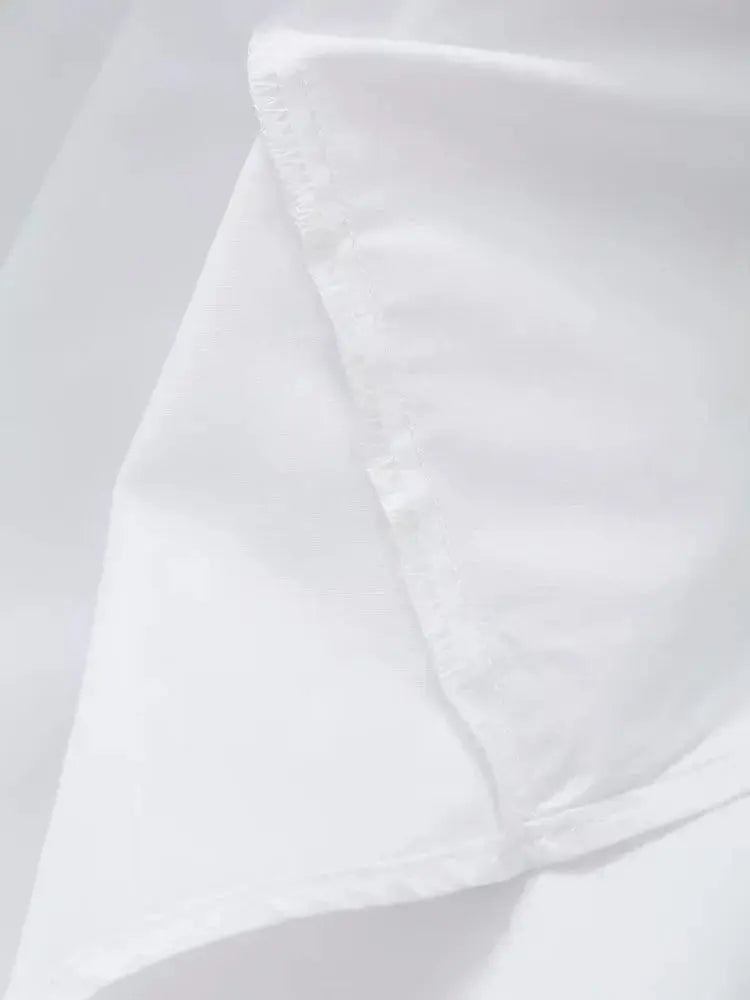 Brigitte | Sleeveless White A-Line Midi Wedding Guest Dress