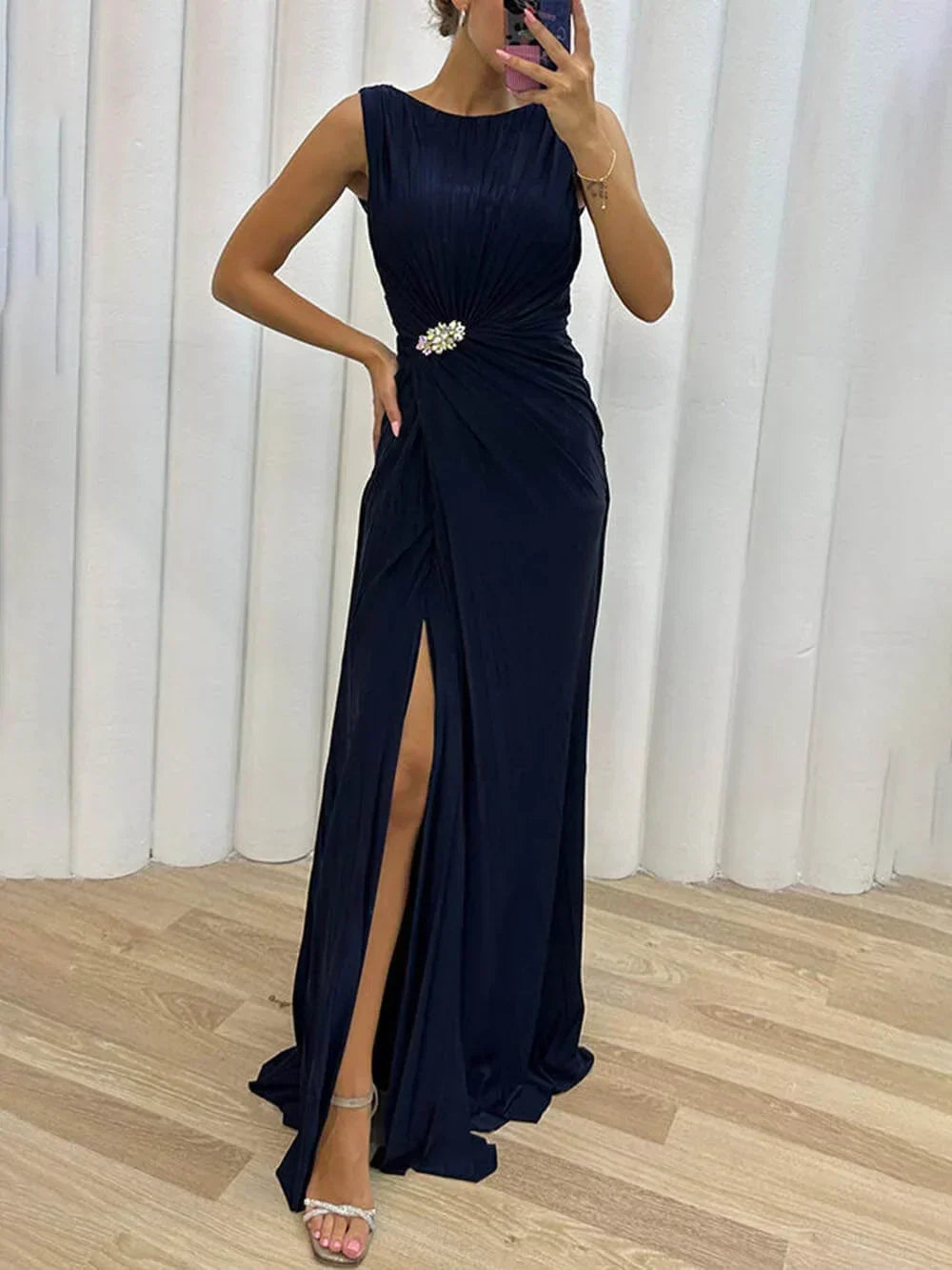 Yellow pleated maxi dress showing skirt movement