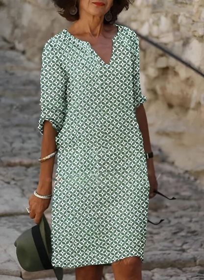 Geometric print dress showing 3/4 sleeves