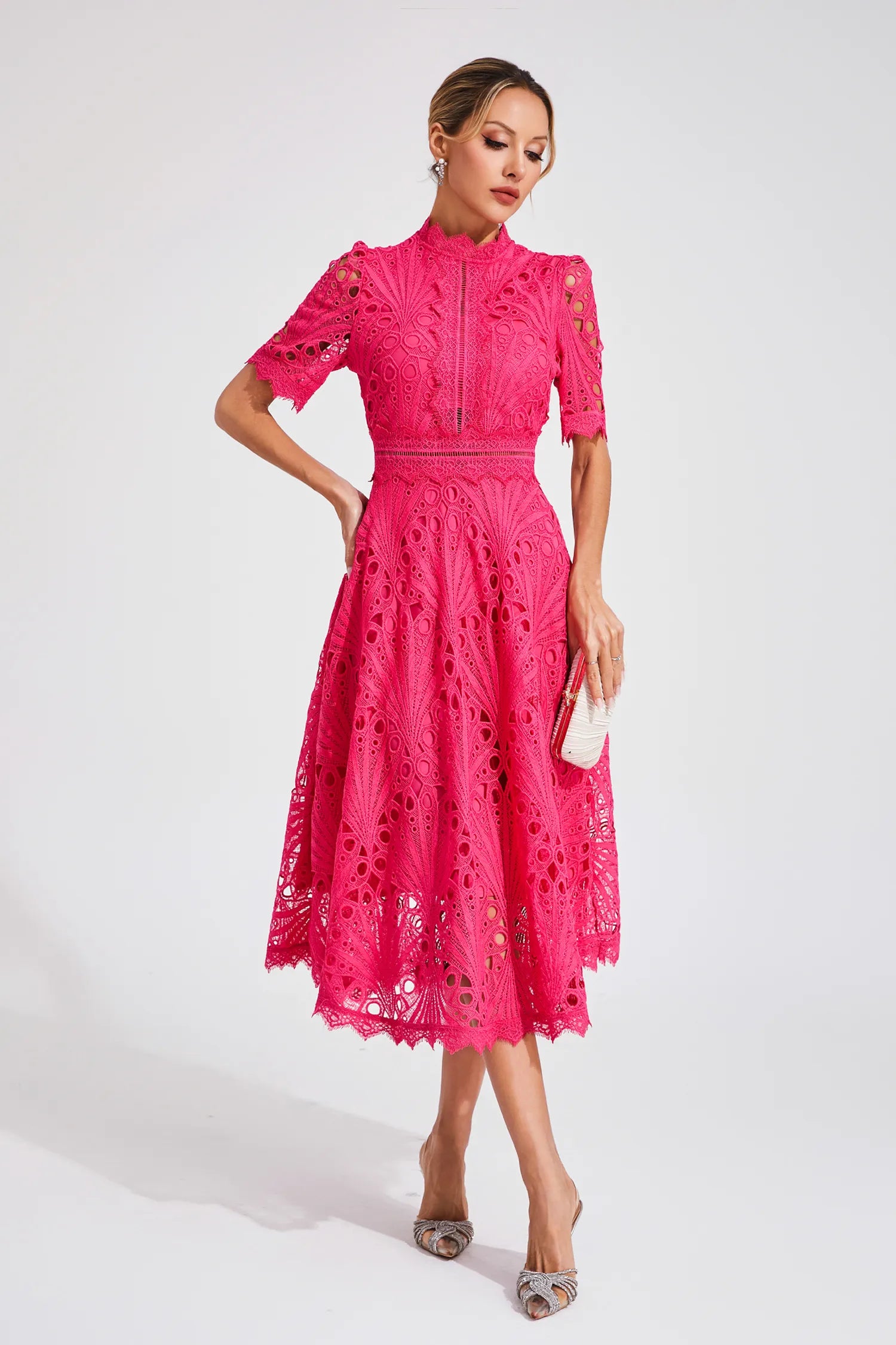 Lace scoop-neck dress styled for a wedding