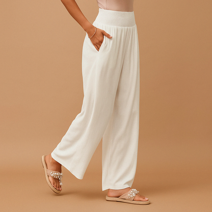 Linen trousers showing elastic high waist