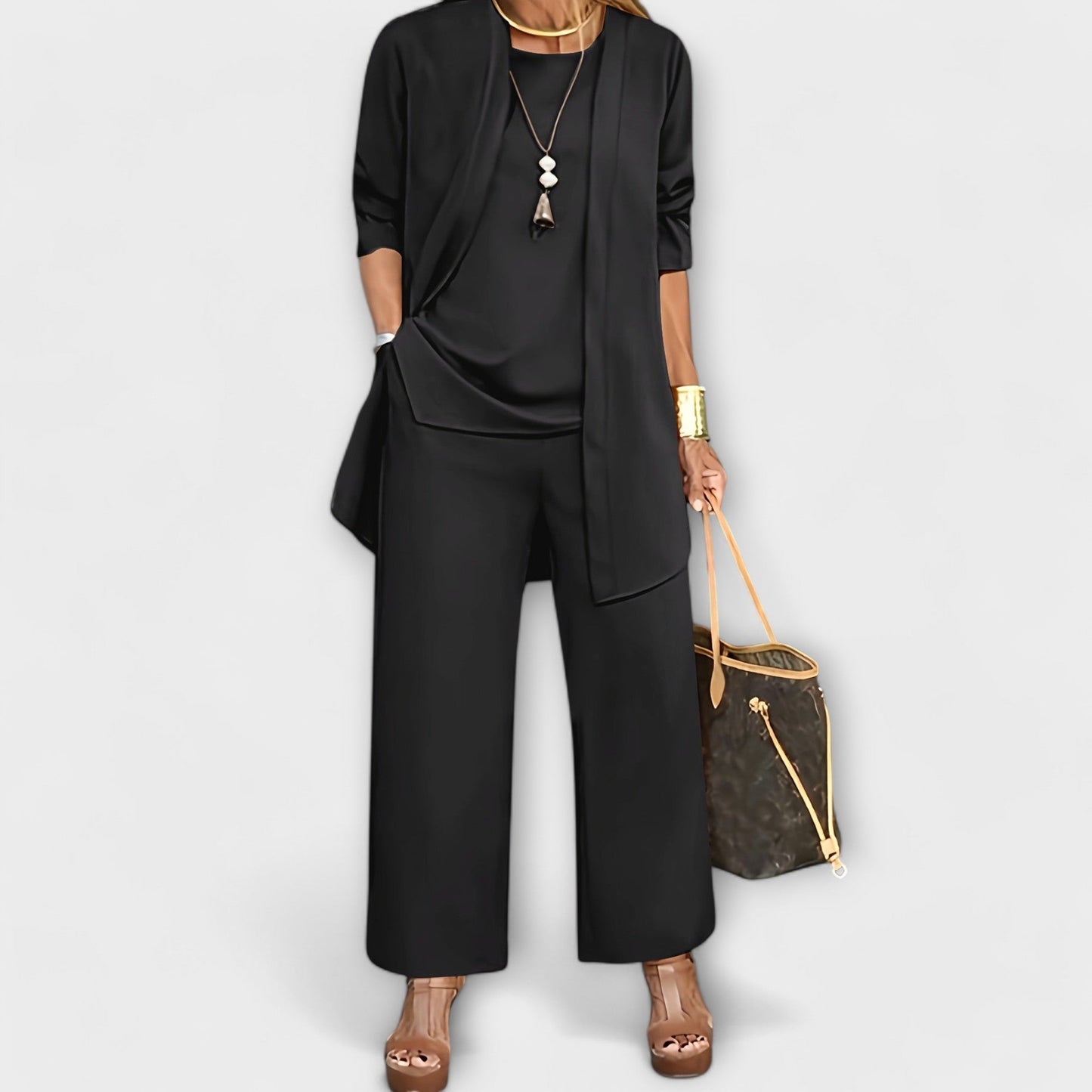 Longline duster cardigan showing sweeping hem