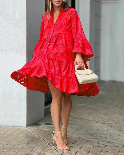 Relaxed button-front mini dress styled with sandals