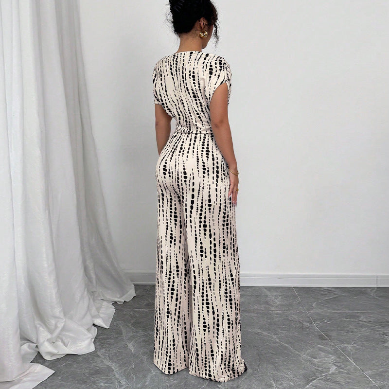 Zaira | One Shoulder Polka Dot Wide Leg Belted Jumpsuit
