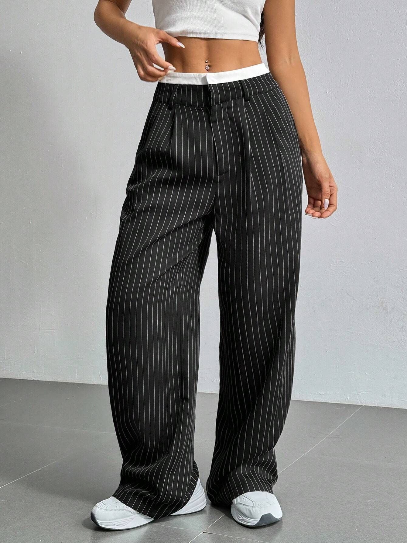 Striped wide-leg trousers showing high waistband detail