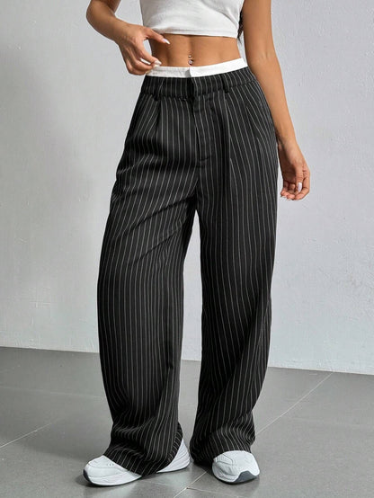 Striped wide-leg trousers showing high waistband detail