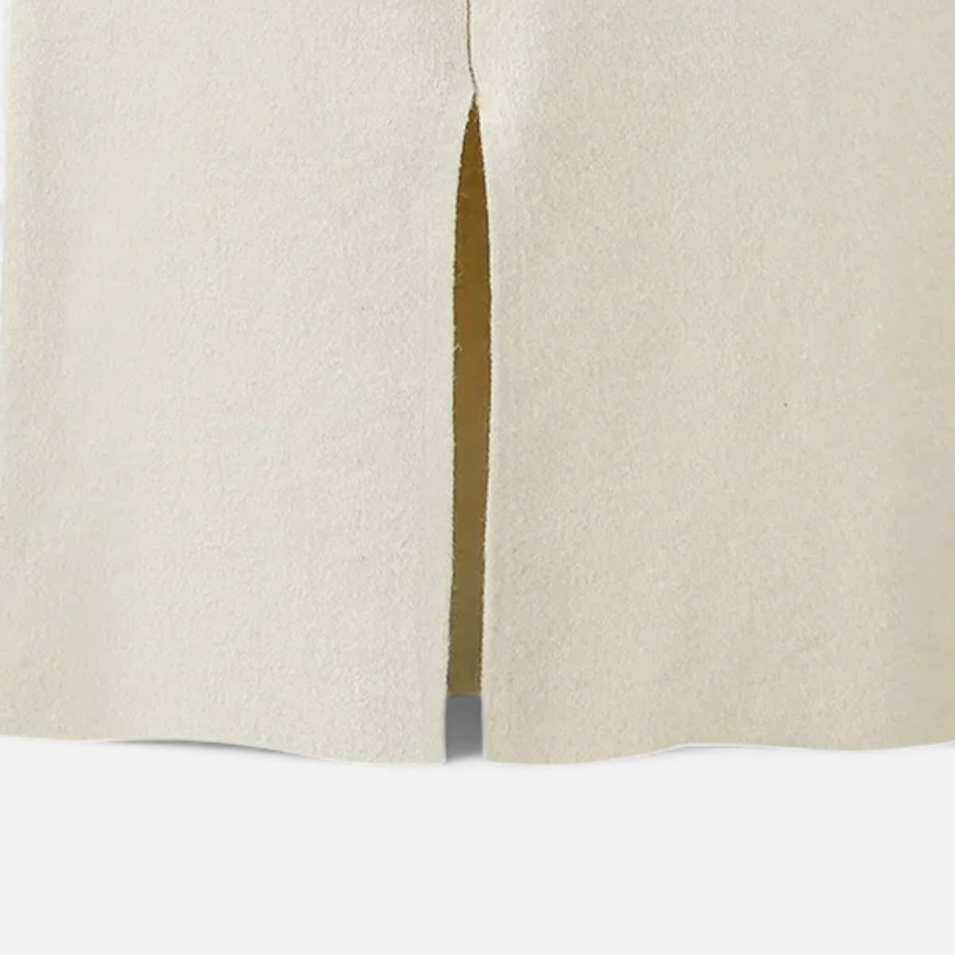High-waist wool skirt styled with knitwear