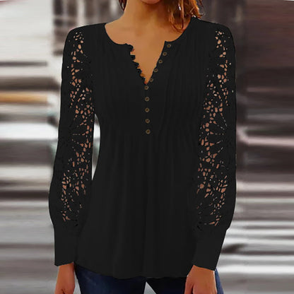 Lace blouse showing floral sleeves and pleated bodice