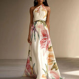Floral halter wedding guest maxi dress, front view