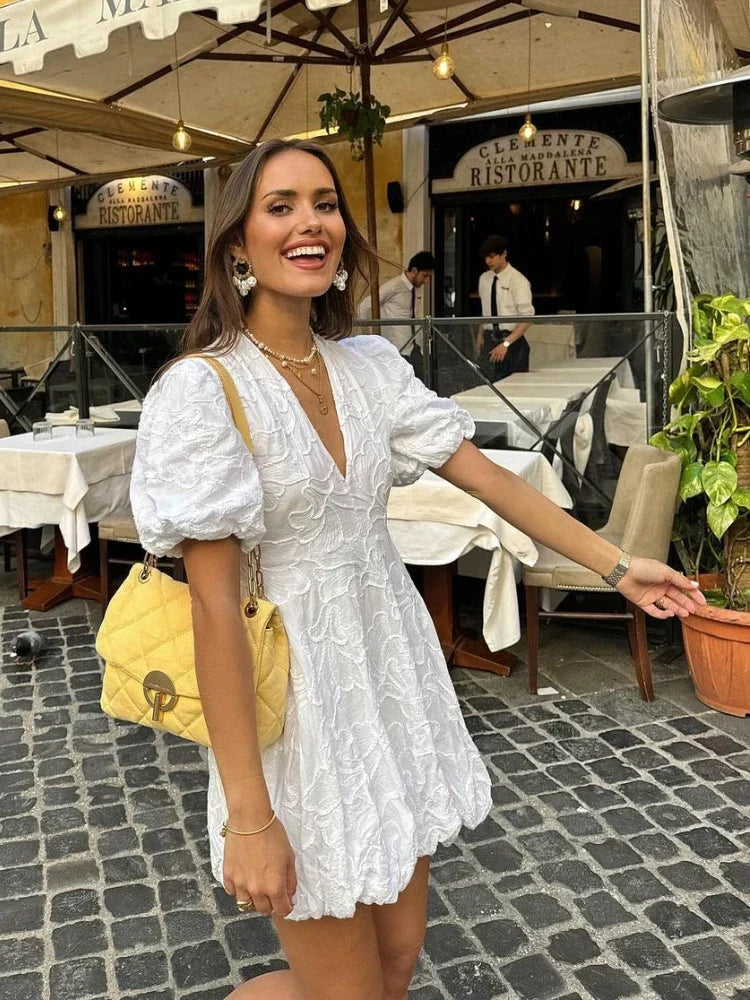 Romilly white embroidered ruffle mini dress front view