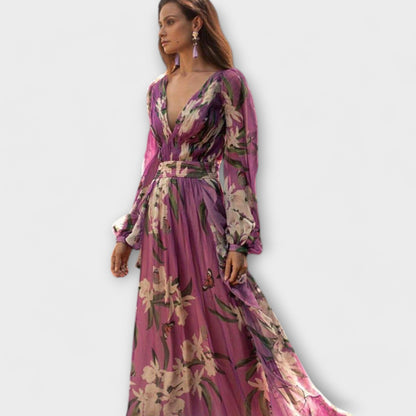 Long-sleeve maxi dress showing flowing skirt