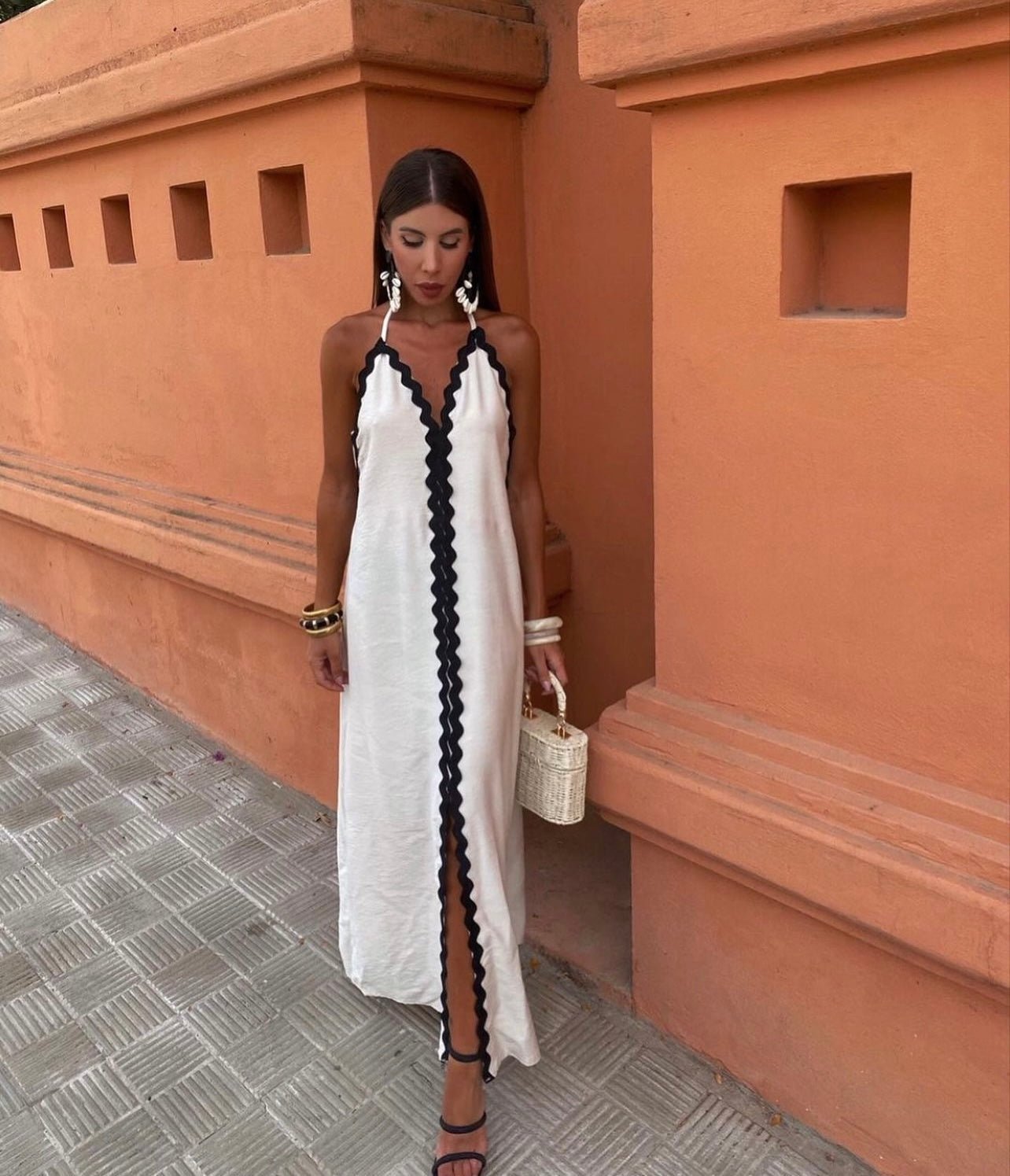 Black wrap maxi dress showing adjustable tie waist