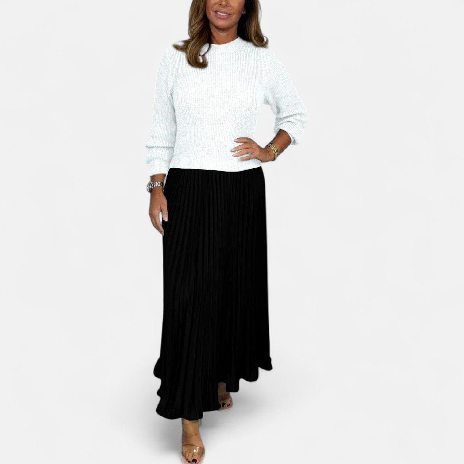 Knit sweater and pleated maxi dress full-length view