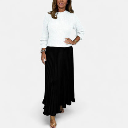Knit sweater and pleated maxi dress full-length view