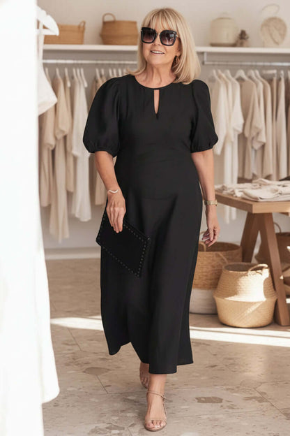 Midi dress showing keyhole neckline detail