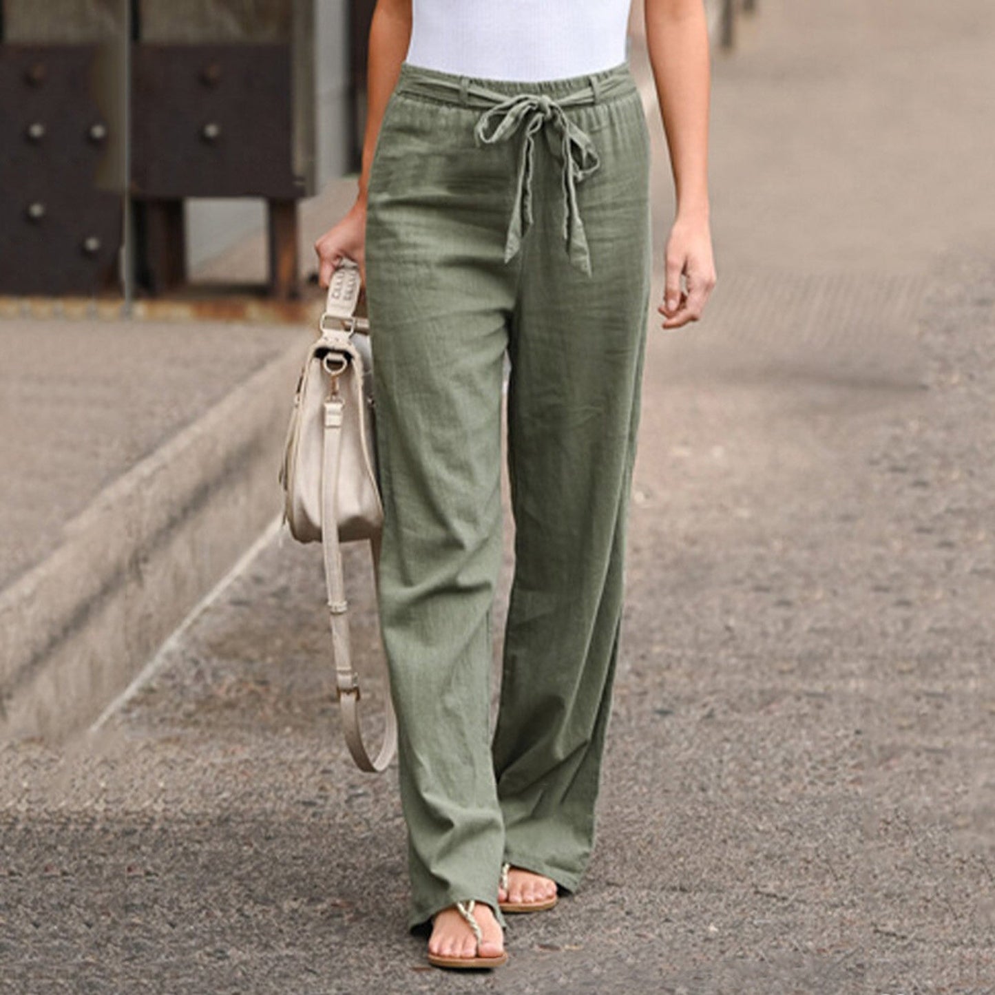 Drawstring trousers showing tie waist detail
